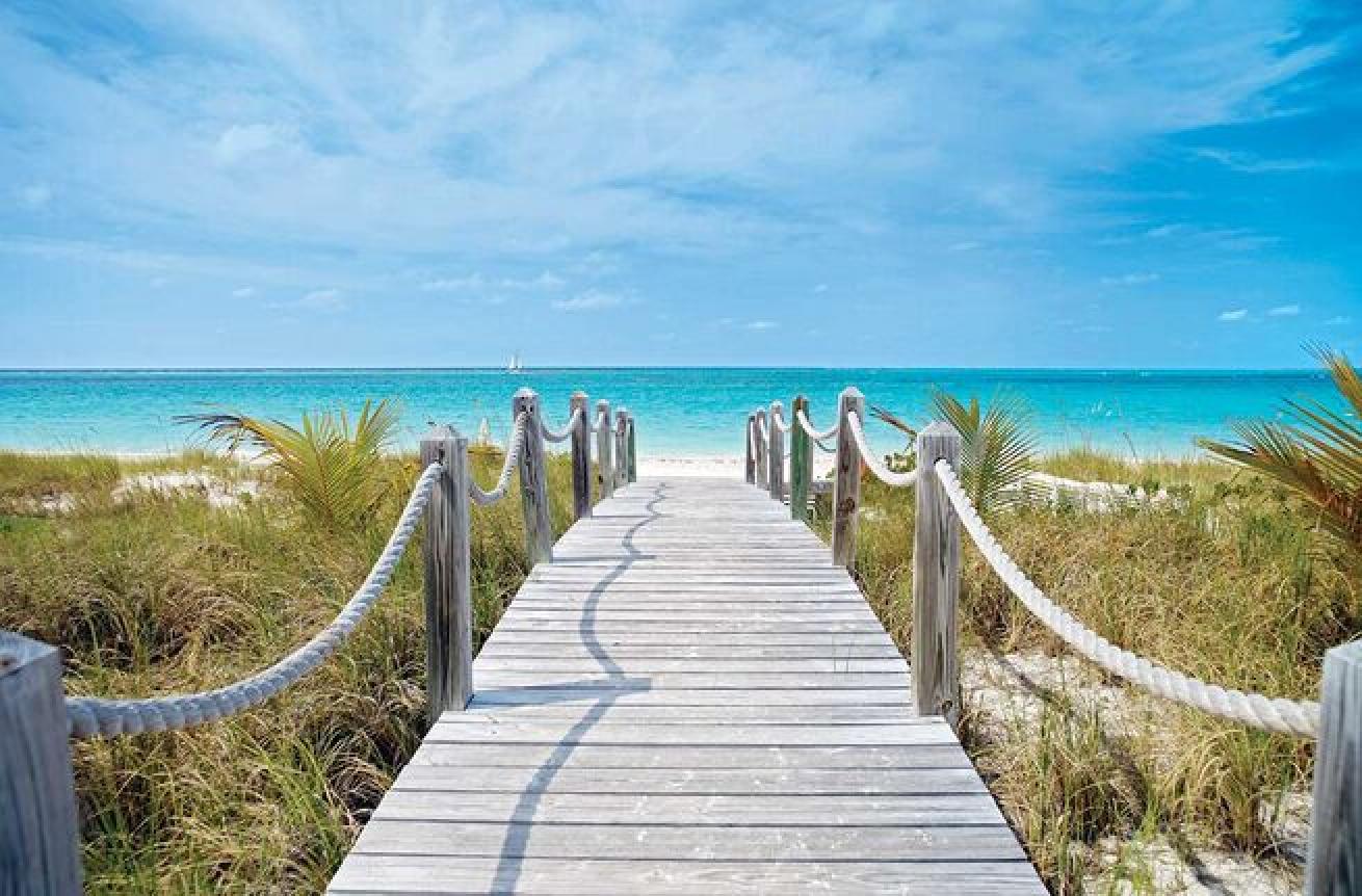 Grace Bay Beach, on Providenciales, is the most famous strand of sand in the Turks and Caicos, and is perfect for a whole host of activities, including sunbathing, snorkeling, sailing, diving and more.
