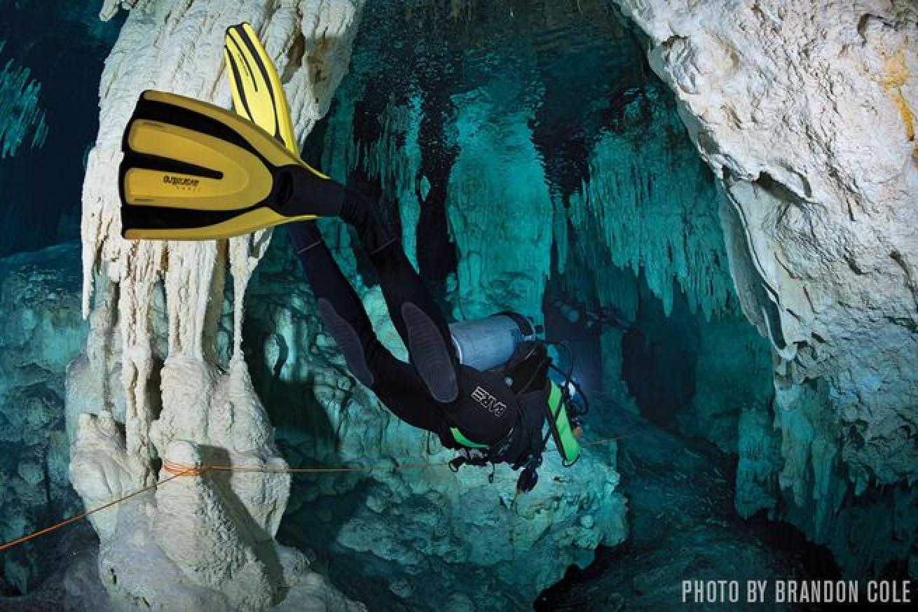 Lines mark the routes that weave through the caverns and tunnels that make up the cenotes, an eerie realm known by the local Maya people as Xibalba, which translates into “Place of Fear.”