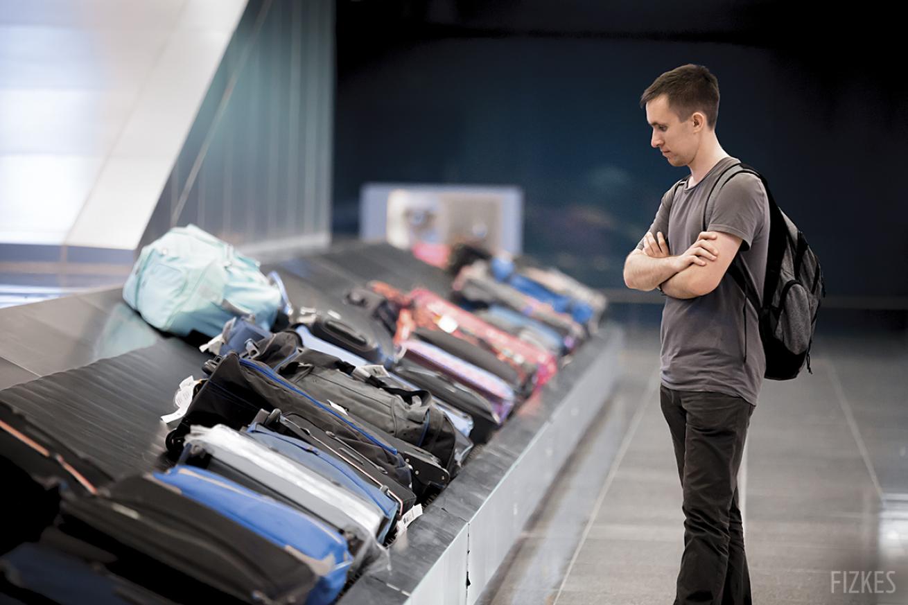 waiting for lost luggage in airport