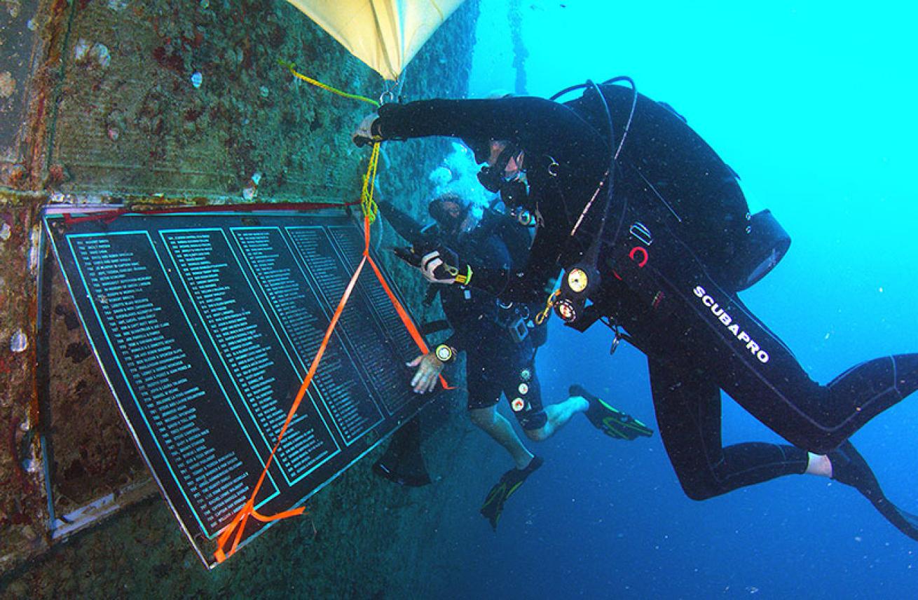 divers install plaque on the Spiegel Grove