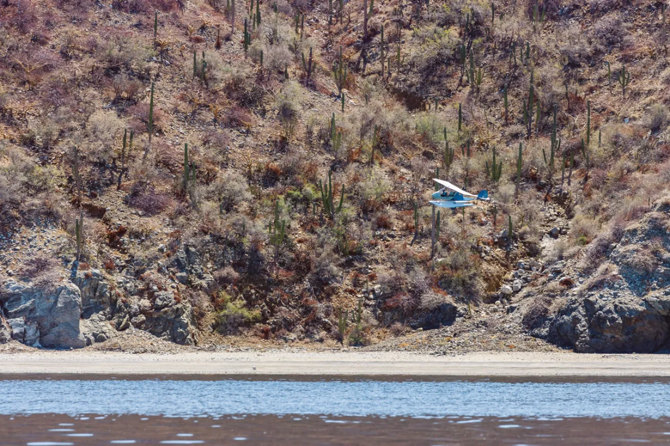 pilot Siddharta Velazquez flies a spotter plane to gather scientific data and assist local scientists