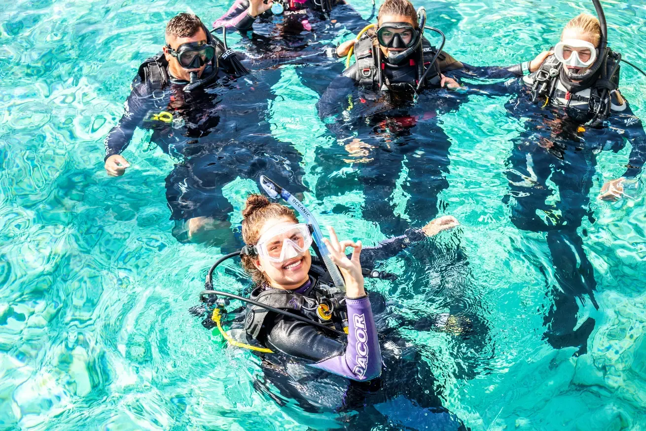 A group of PADI Instructor Development Course candidates at Buddy Dive Academy at Buddy Dive Resort in Bonaire