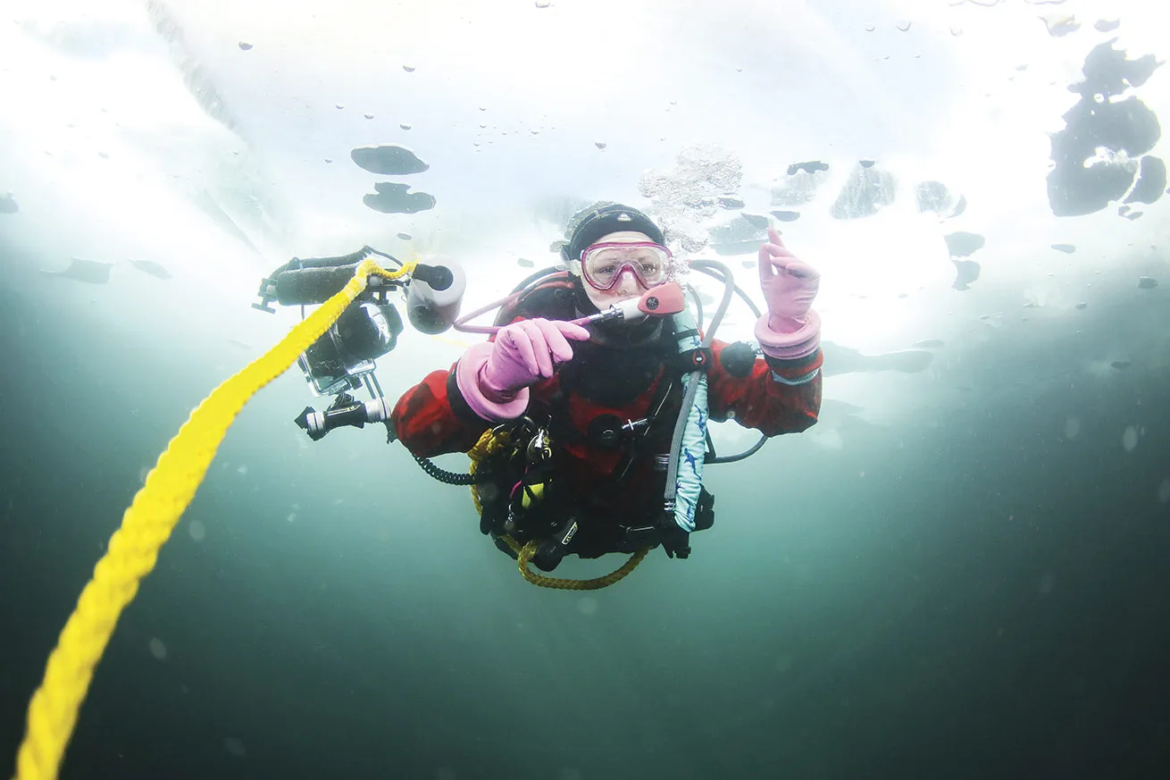 Rich Synowiec’s daughter, Natalie, embraces the ice-diving life. 