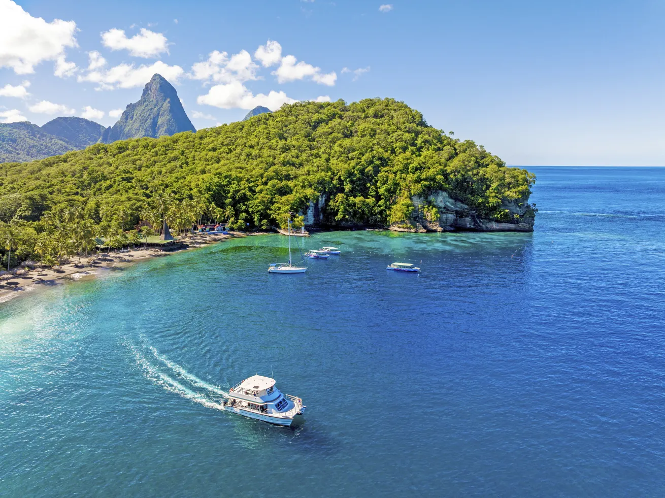 Drone shot of Anse Chastanet in St. Lucia with the Scuba St Lucia dive boat