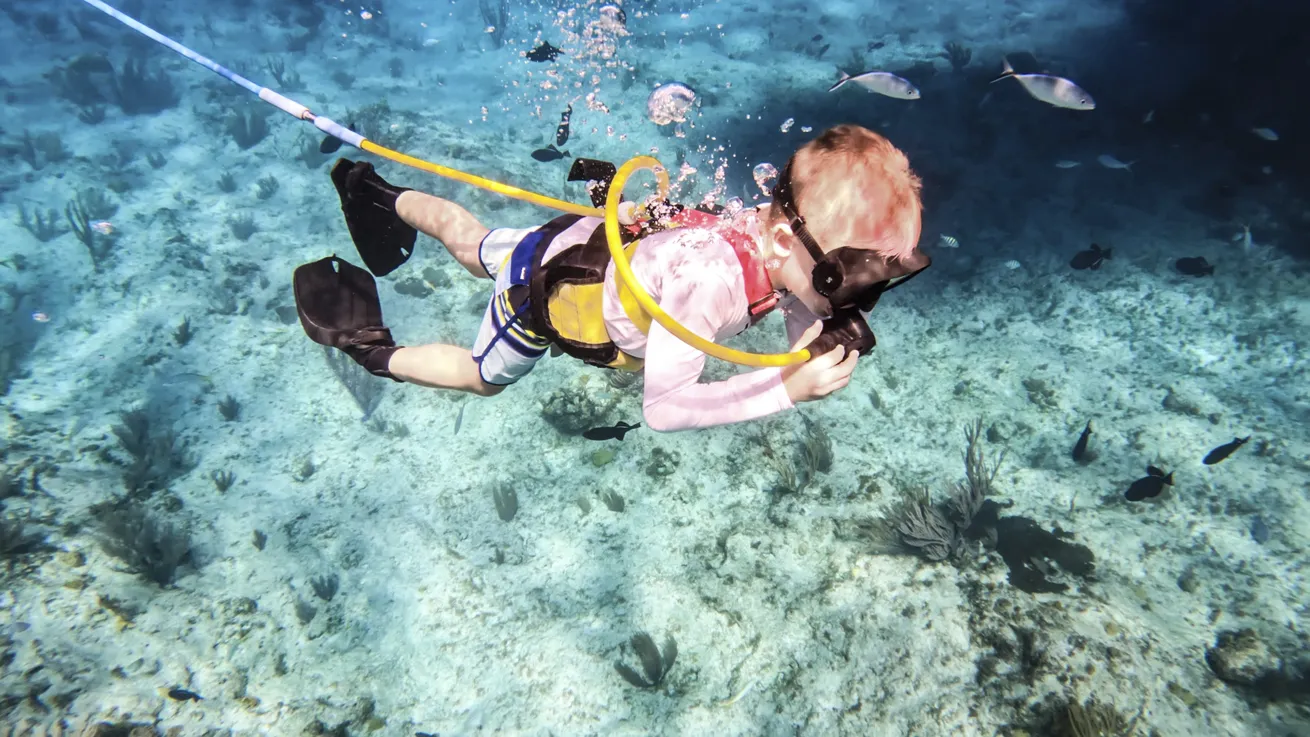Younger guests interested in diving can learn the fundamentals in shallow water.