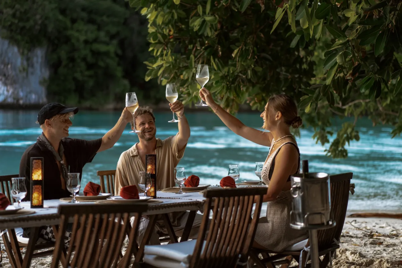 The guests of Pearl Fleet enjoying a beach barbecue.