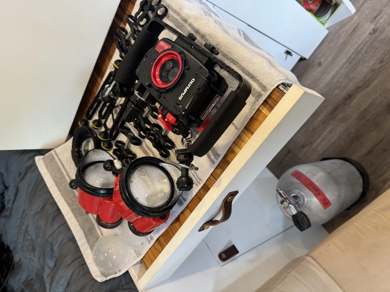 You can thoroughly rinse your camera gear in the sink and use countertop or desktop space for drying.