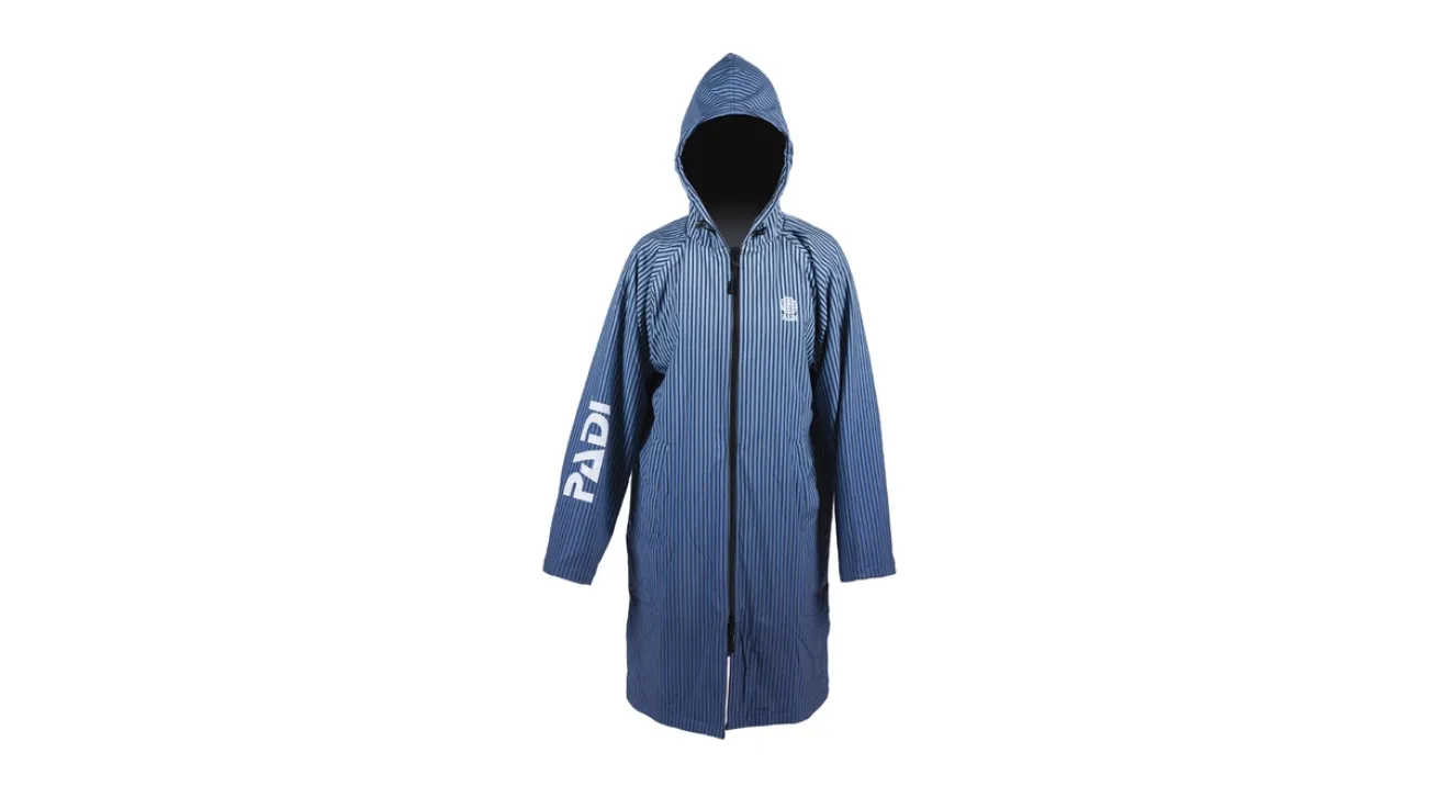 Long, blue hooded jacket with a front zipper and "PADI" printed in white on the left sleeve. The jacket features a subtle vertical stripe pattern and a small white logo on the left chest area.