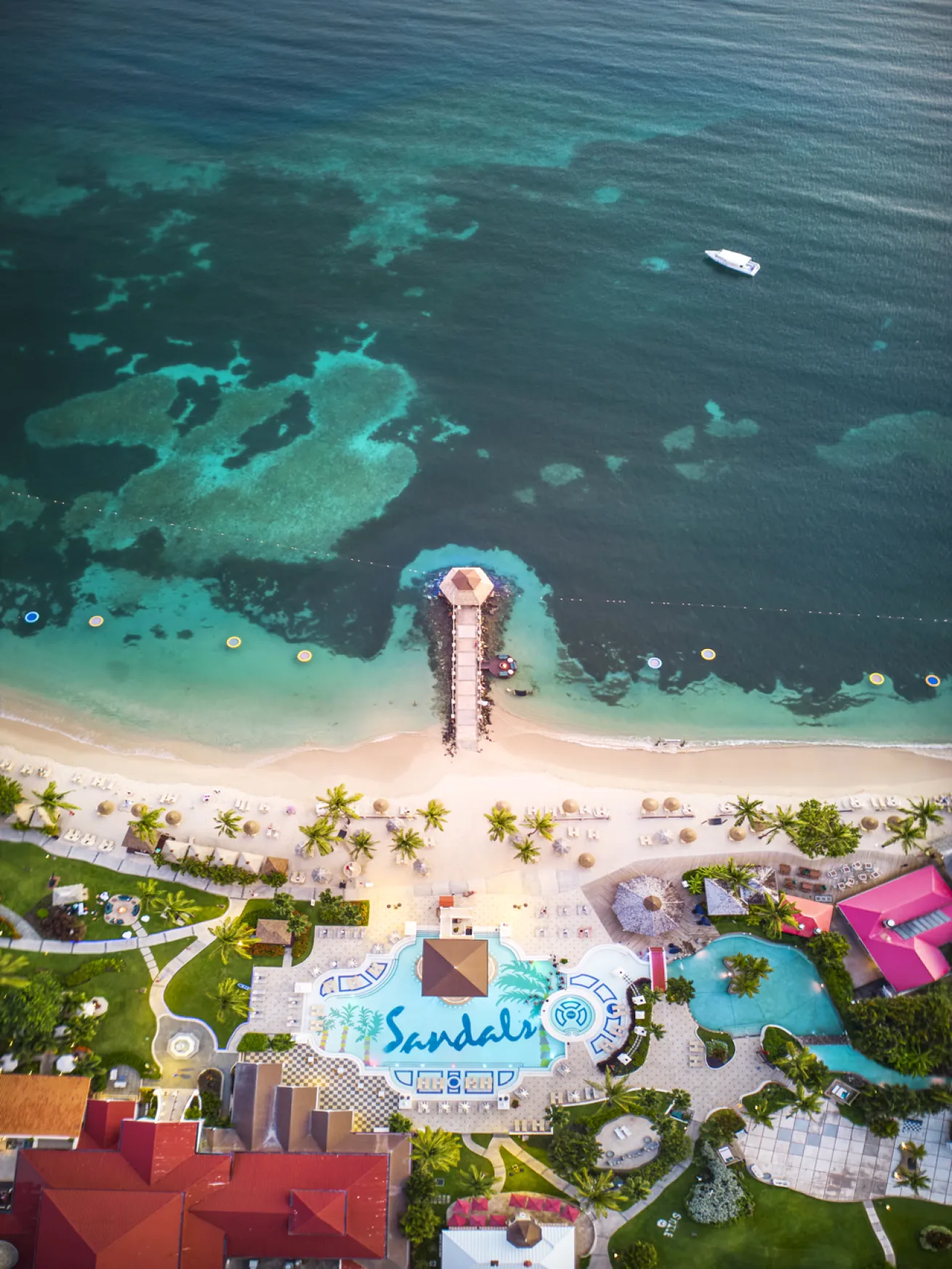 A pool view of Sandals Grande St. Lucian, one of three Sandals resorts on the island.
