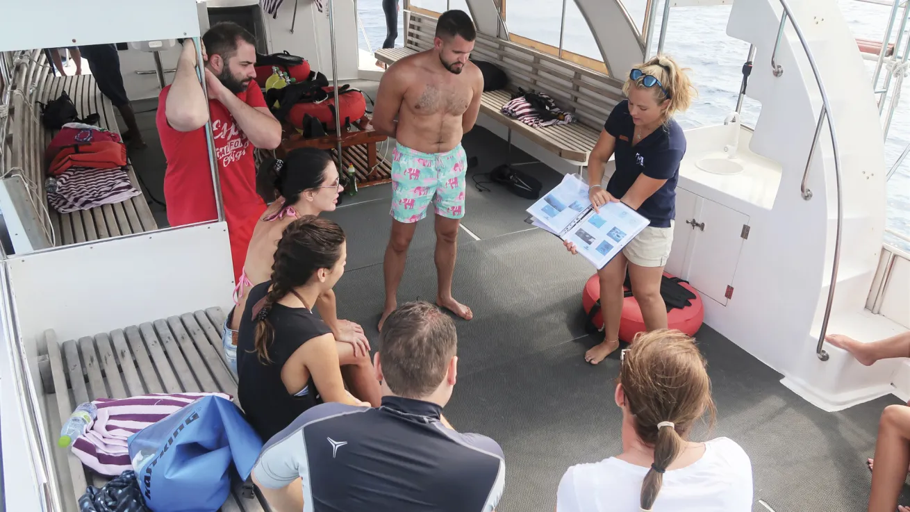 Guests are briefed before a dive.