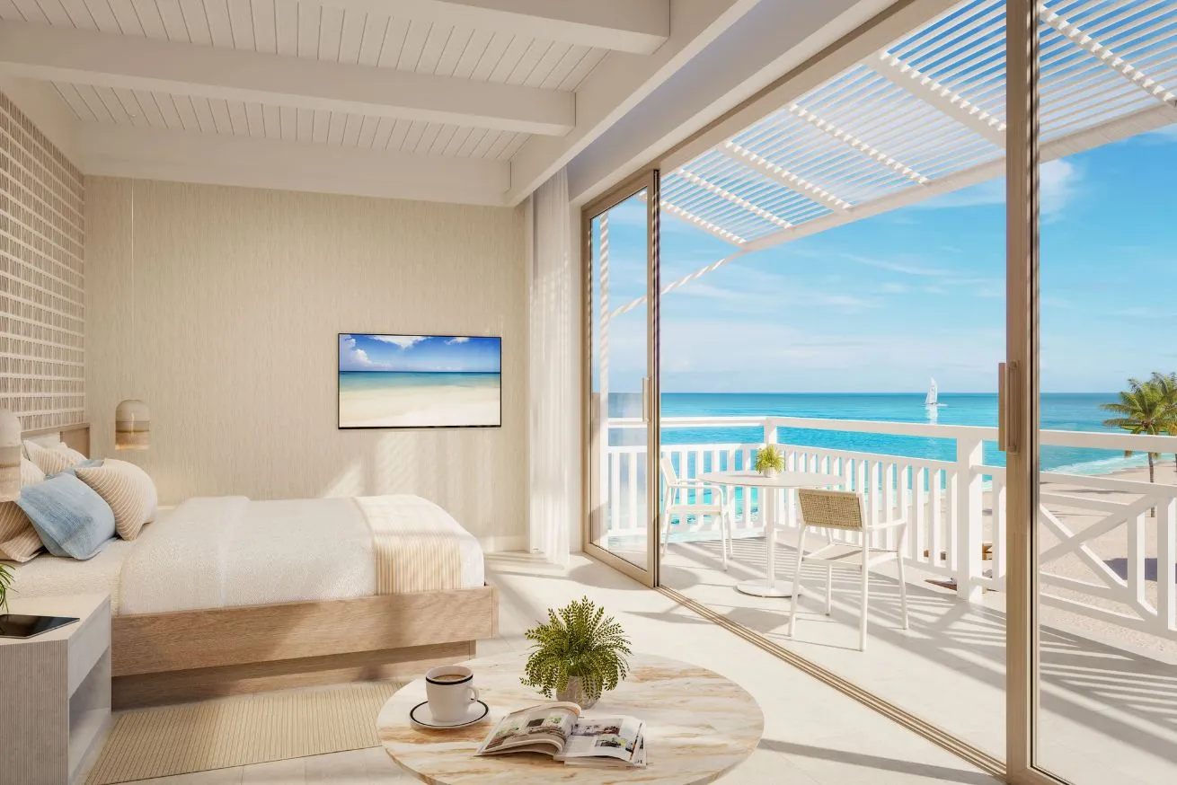 Bedroom overlooking the beach and ocean at the new Sandals Montego Bay resort in Jamaica.