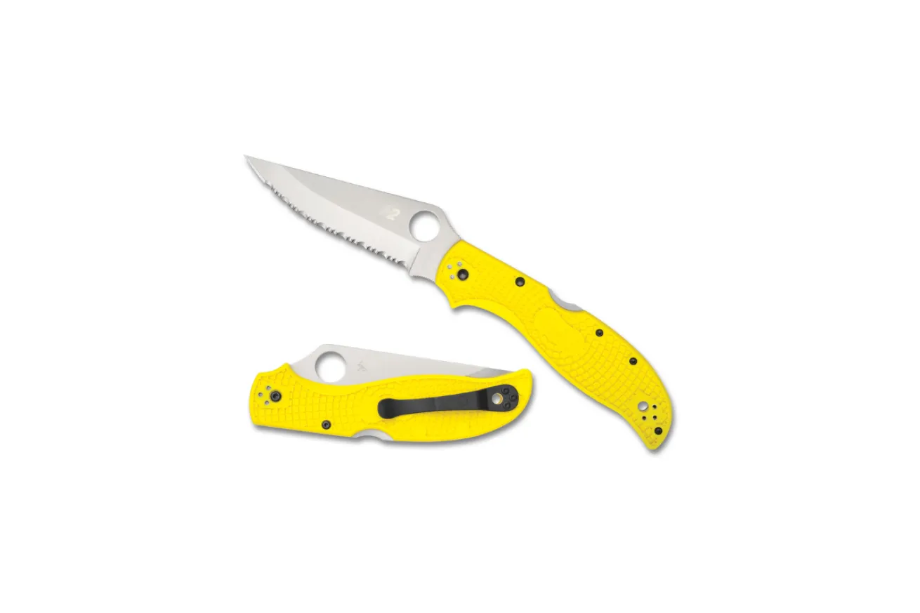 Yellow-handled folding dive knife with a long stainless-steel blade and textured grip, designed for lightweight carry and corrosion resistance.