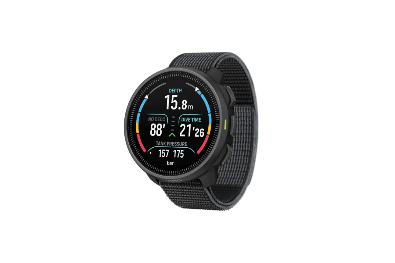 Round wrist-mounted dive computer with color display showing depth, dive time, and tank pressure, designed for advanced recreational diving.