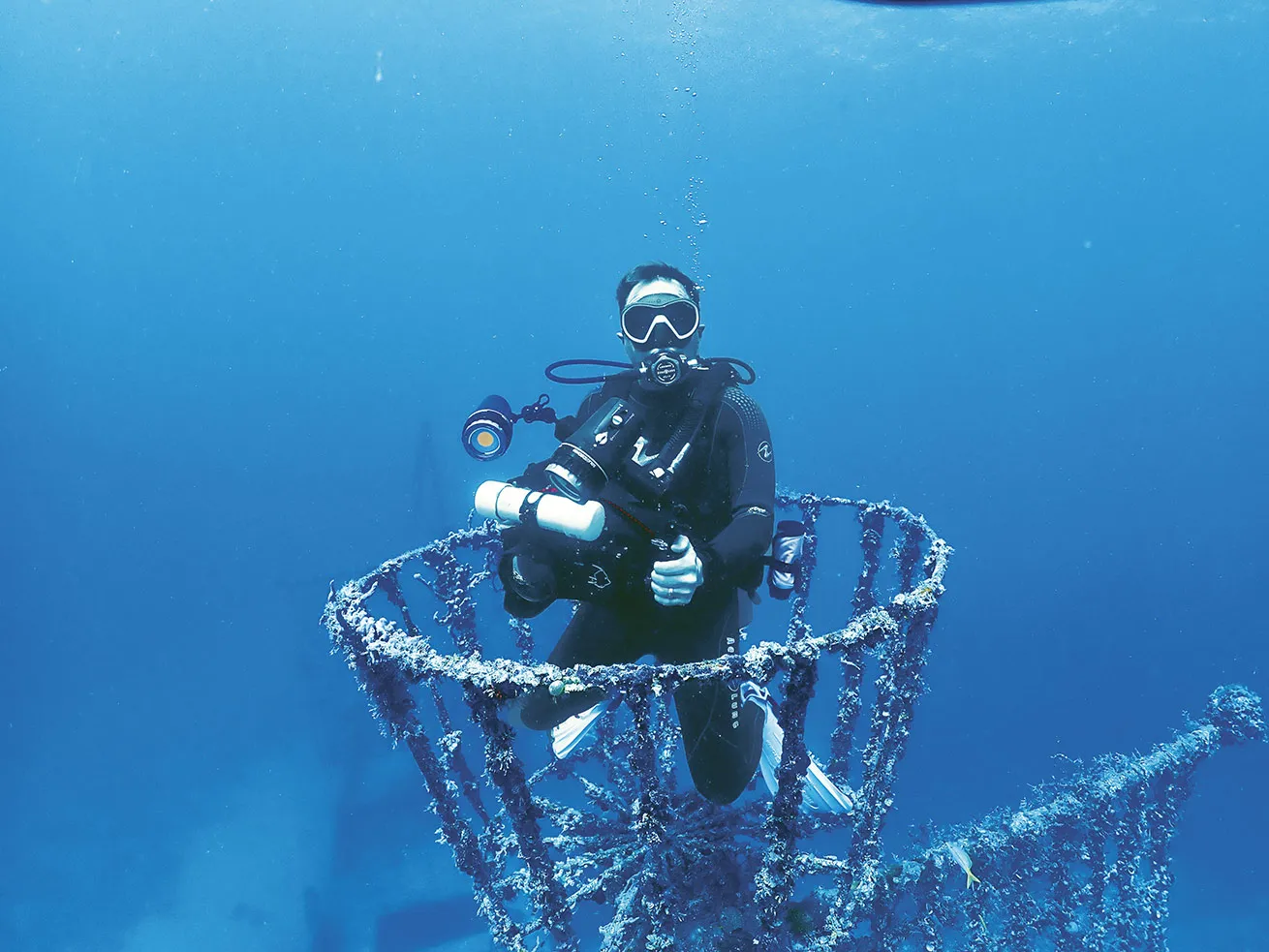 Brown in 2023 in the Crows Nest of the *Willy T*  during a trip on the *BVI Aggressor* (now the *Bahamas Aggressor II*).