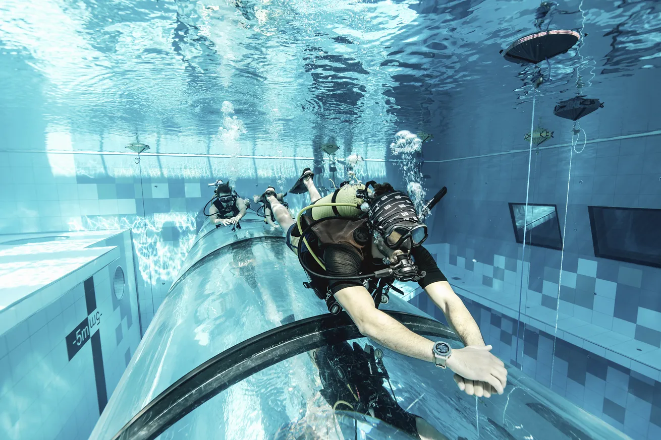 The 2 million-gallon pool at Deepspot has a variety of training features, including passageways.