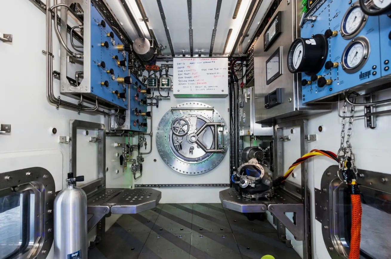 Looking from the living chamber through the service space and into the dive center.