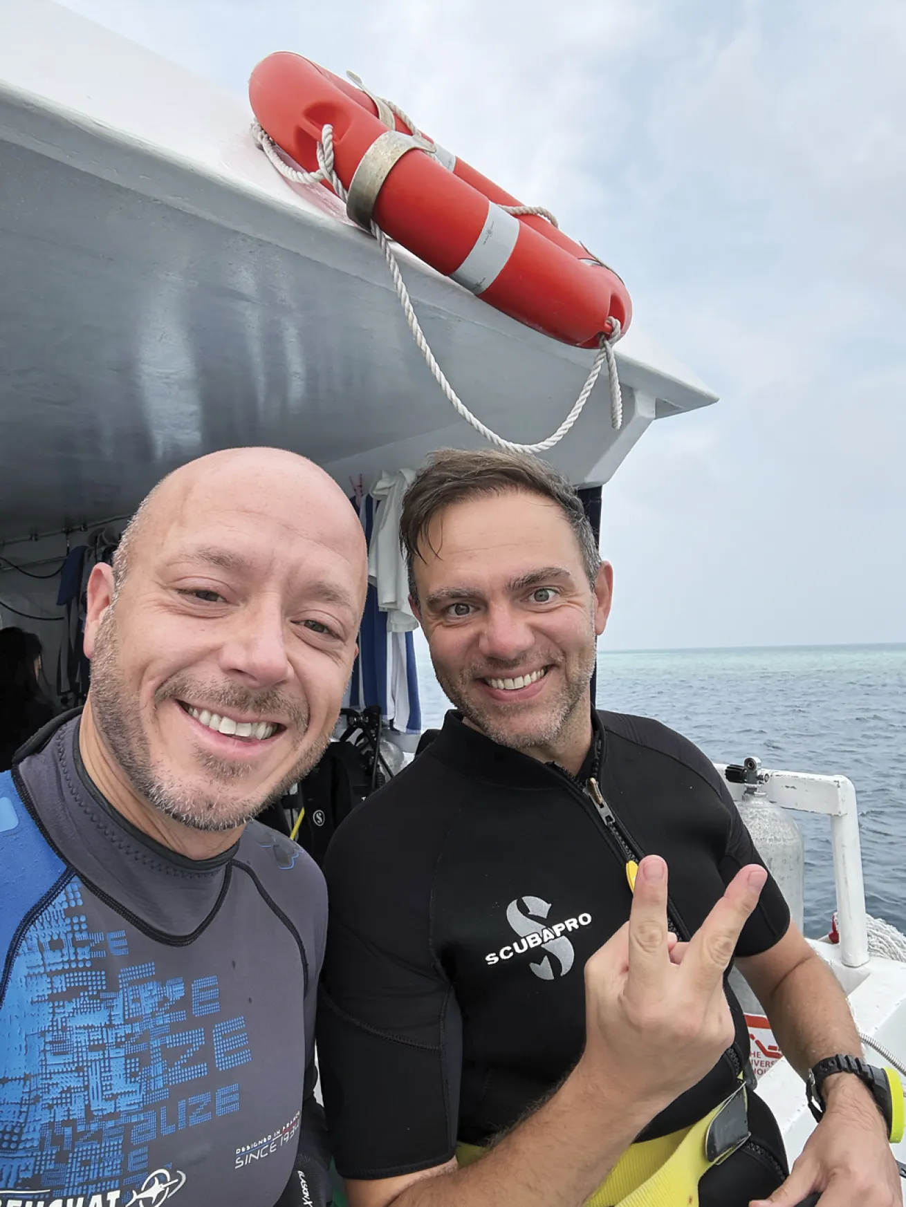 The author (left) and dive buddy Marco en route to a dive site.