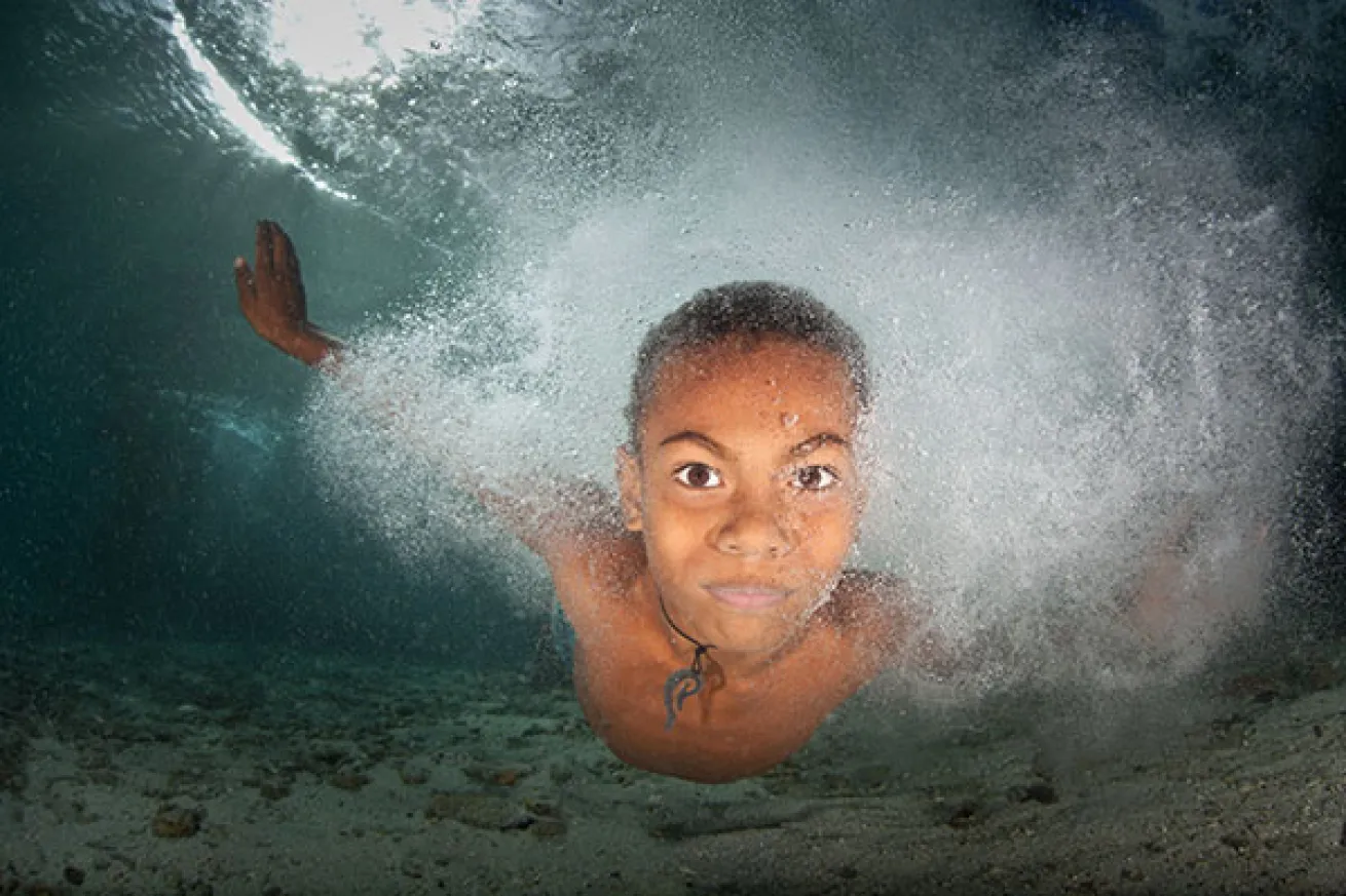 Village Boy Swimming