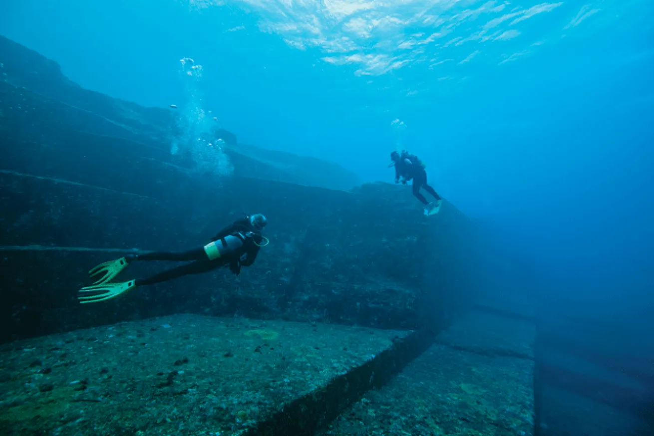 Divers study the bizarre angles of the Yonaguni Monument