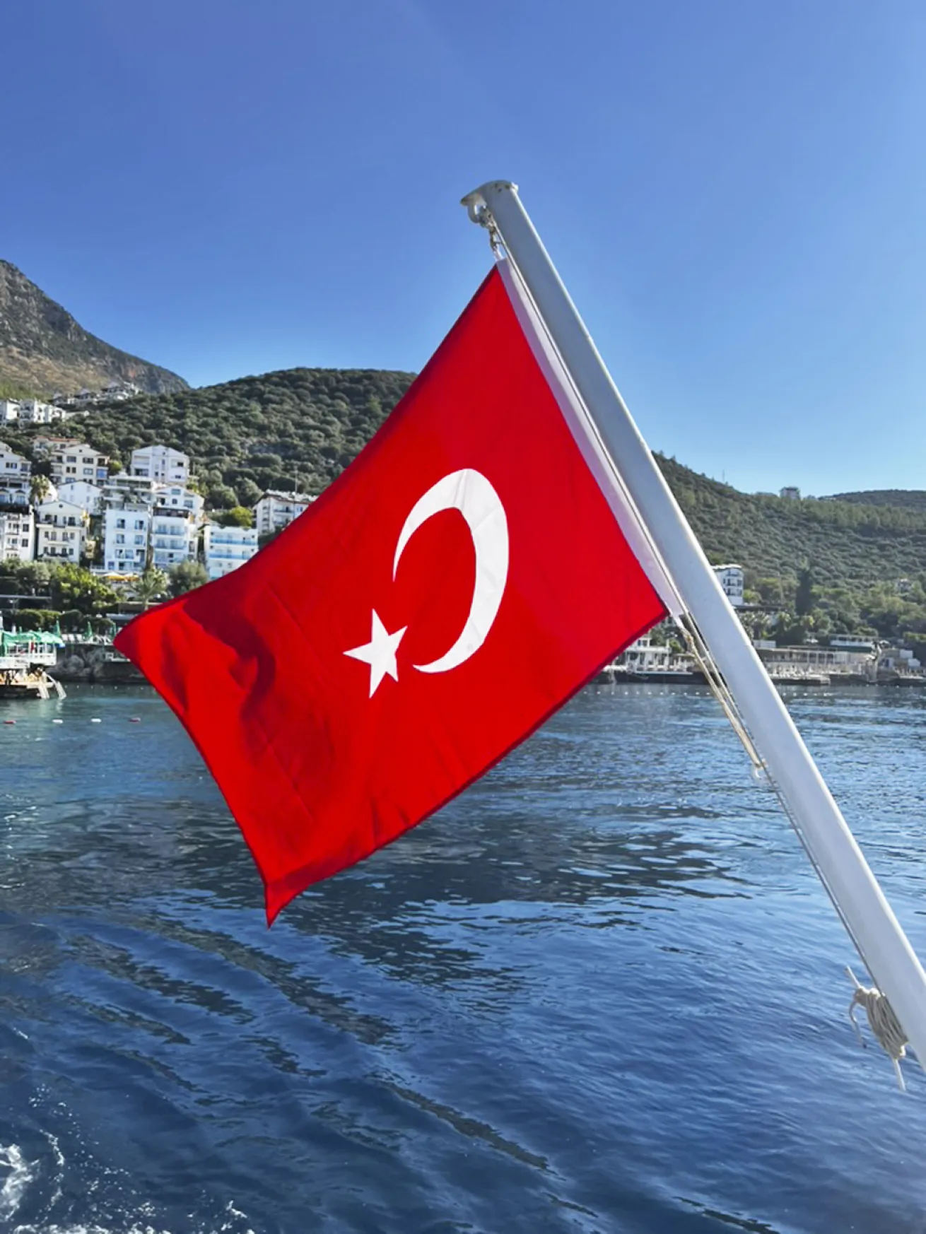 The dive boat sports Turkey’s official flag.