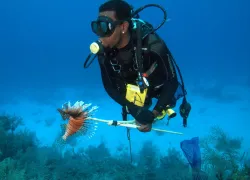 sam-with-lion-fish.jpg.webp
