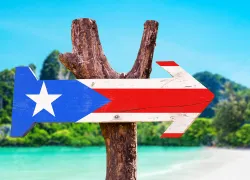 puerto-rico-flag-wooden-arrow-shutterstock-gustavo-frazao.jpg.webp