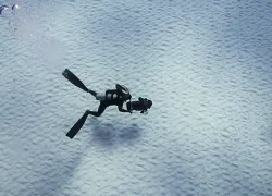 solo-scuba-diving-photographer.jpg.webp