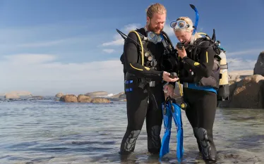 couple-beach-predive-safety-check-shutterstock-juice-flair.jpg.webp
