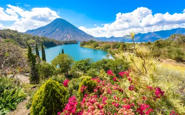 guatemala-lake-atitlan-flowers-shore-shutterstock-simon-dannhauer.png.webp