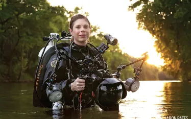 jennifer-idol-cave-diver-photographer-with-camera.jpg.webp