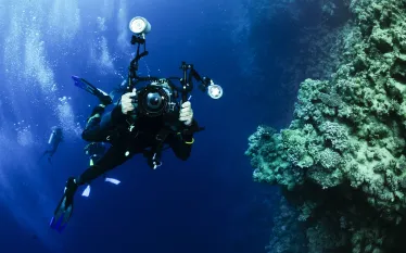underwater-photographer-scuba-shutterstock-jonmilnes.jpg.webp