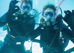 Divers in pool