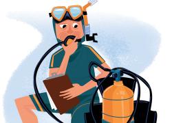 Scuba diver performs pre-dive safety check