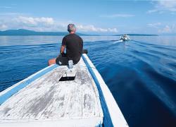 A solo diver overlooking the waters of Bali 