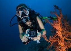 scuba diver with camera 