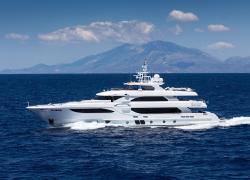 Superyacht with land in background