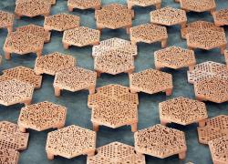 Collection of terracotta tiles for artificial reefs.